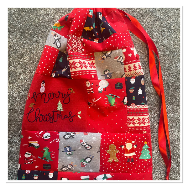 Baby clothes keepsake Christmas sack